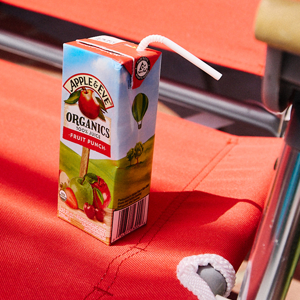 Fruit punch Juice box on a red chair