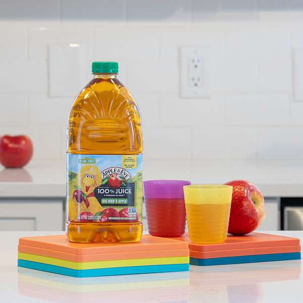 Big Bird Juice Bottle and glasses of juice